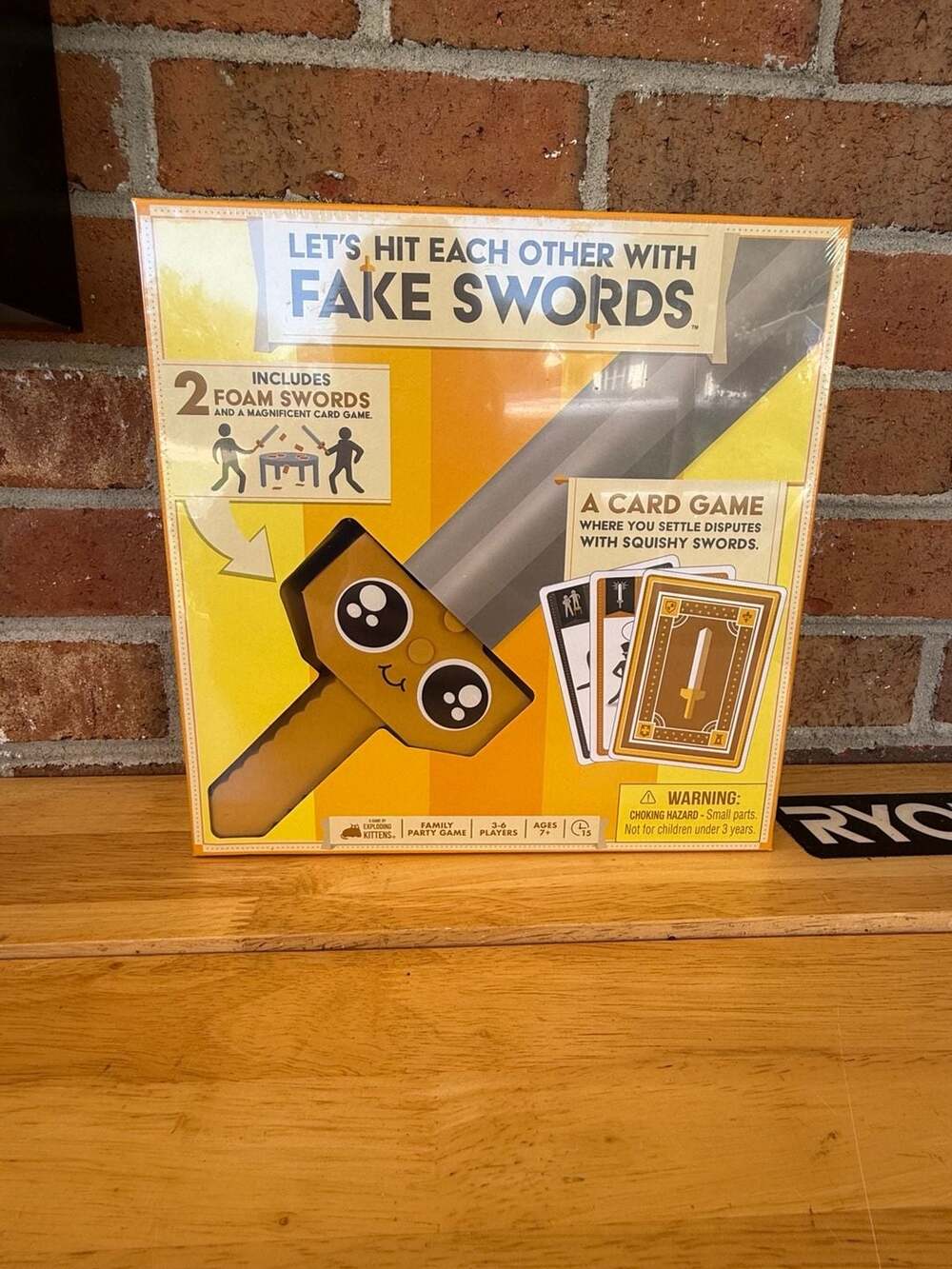 Exploding Kittens Let's Hit Each Other With Fake Swords Family Party Card Game